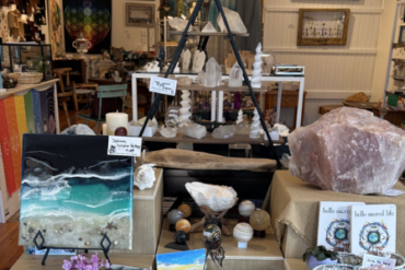 Banner showcasing Metamorphic Rock Shoppe and Gallery's collection of Shungite and Baltic Amber products, featuring jewelry and protective stones for natural healing and EMF protection