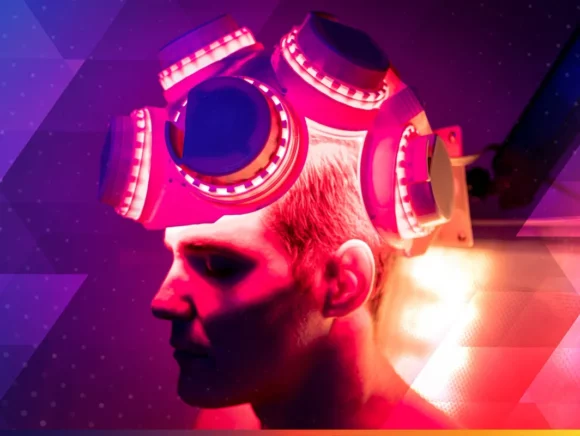 Person using the SunPowerLED transcranial helmet for Red Light therapy at home, targeting brain health and cognitive support.