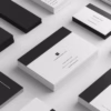 A collection of monochrome business card layouts with a sleek, professional design by Break Point Design.