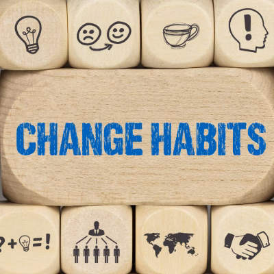 Wooden Blocks with 'Change Habits' Text, Representing Positive Behavioral Change